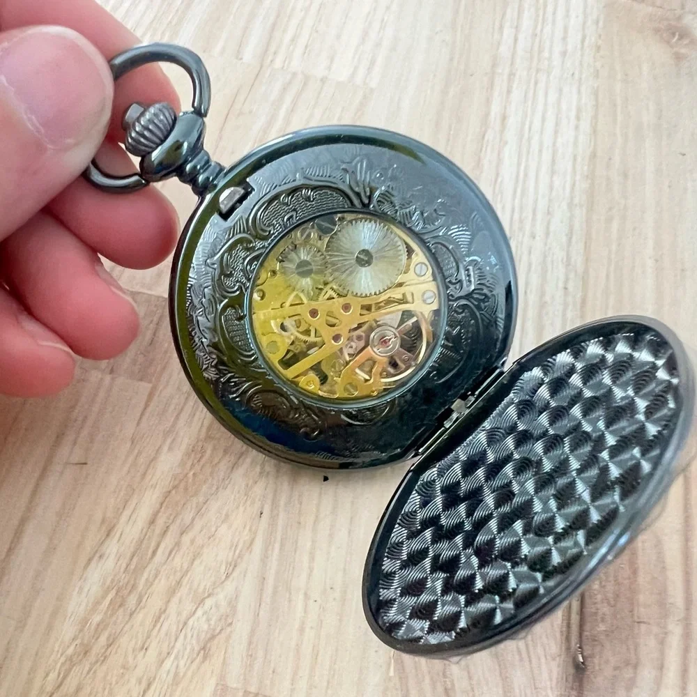 Black mechanical double sided Skelton peephole pocket watch working